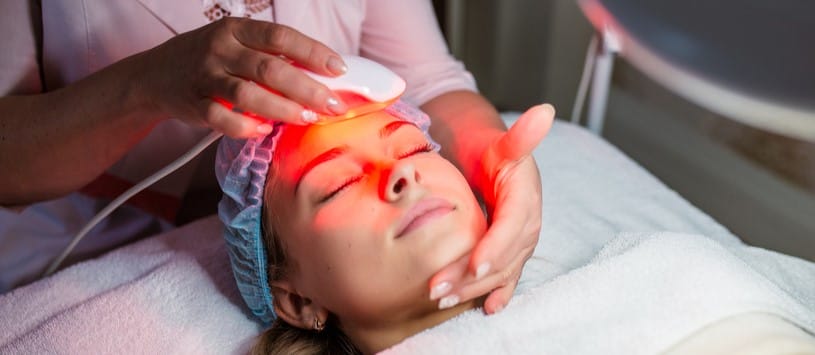 laser light therapy treatment on face.