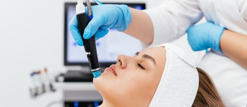 Hydrofacial Certificate. Female client receiving a hydrofacial treatment.